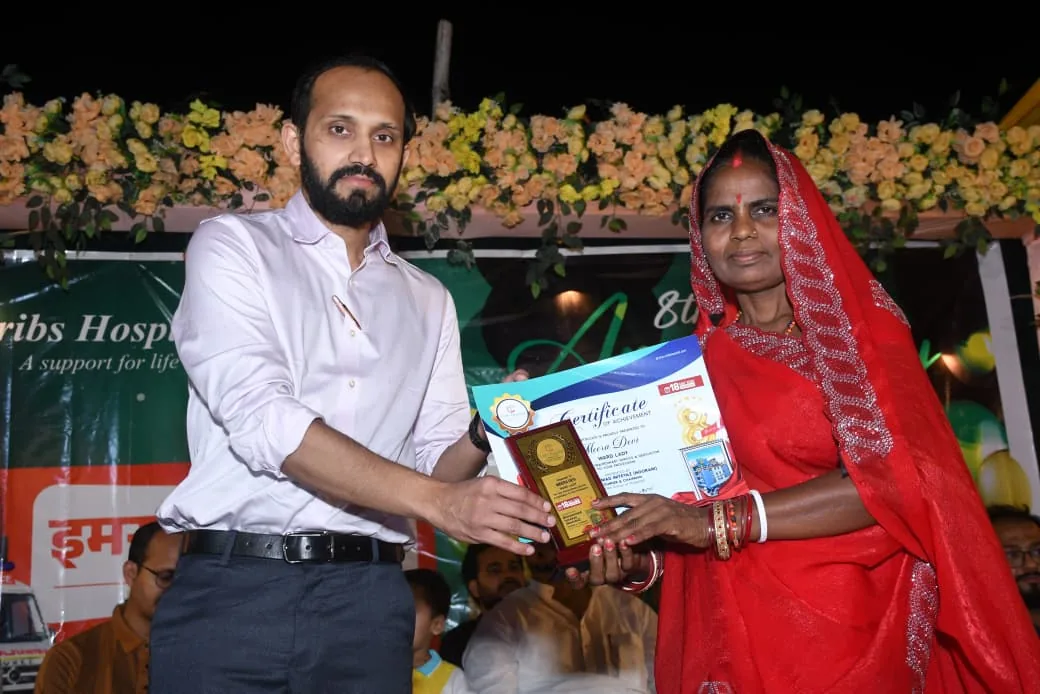 Dr. Abu Ammar Rizvi being felicitated at a Cribs Hospital event