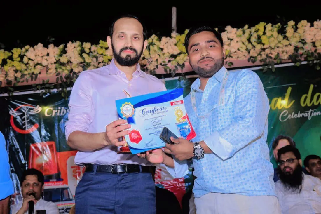 Dr. Abu Ammar Rizvi being felicitated at a Cribs Hospital event