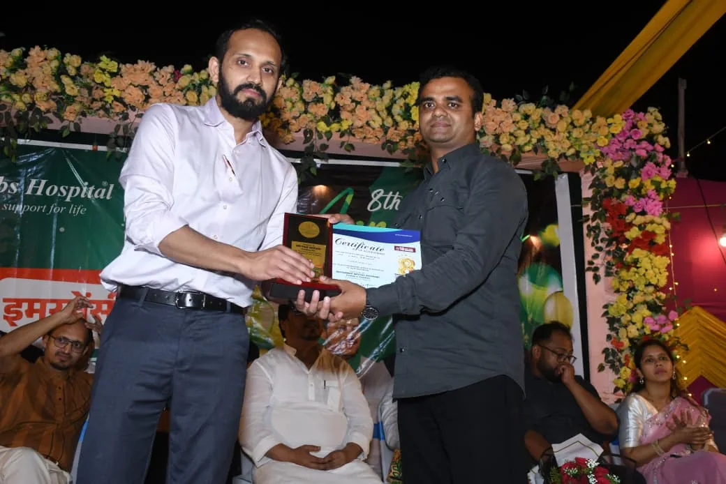 Dr. Abu Ammar Rizvi being felicitated at a Cribs Hospital event